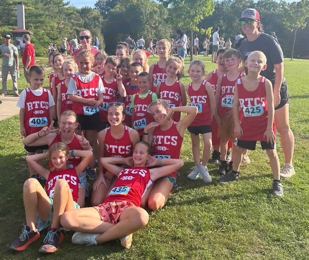 The 2026 RTCS cross country team with Coach Jessica Johnson